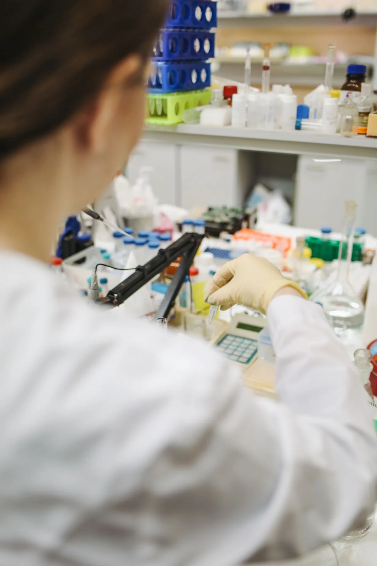 Laboratory specialist working with test tubes and samples